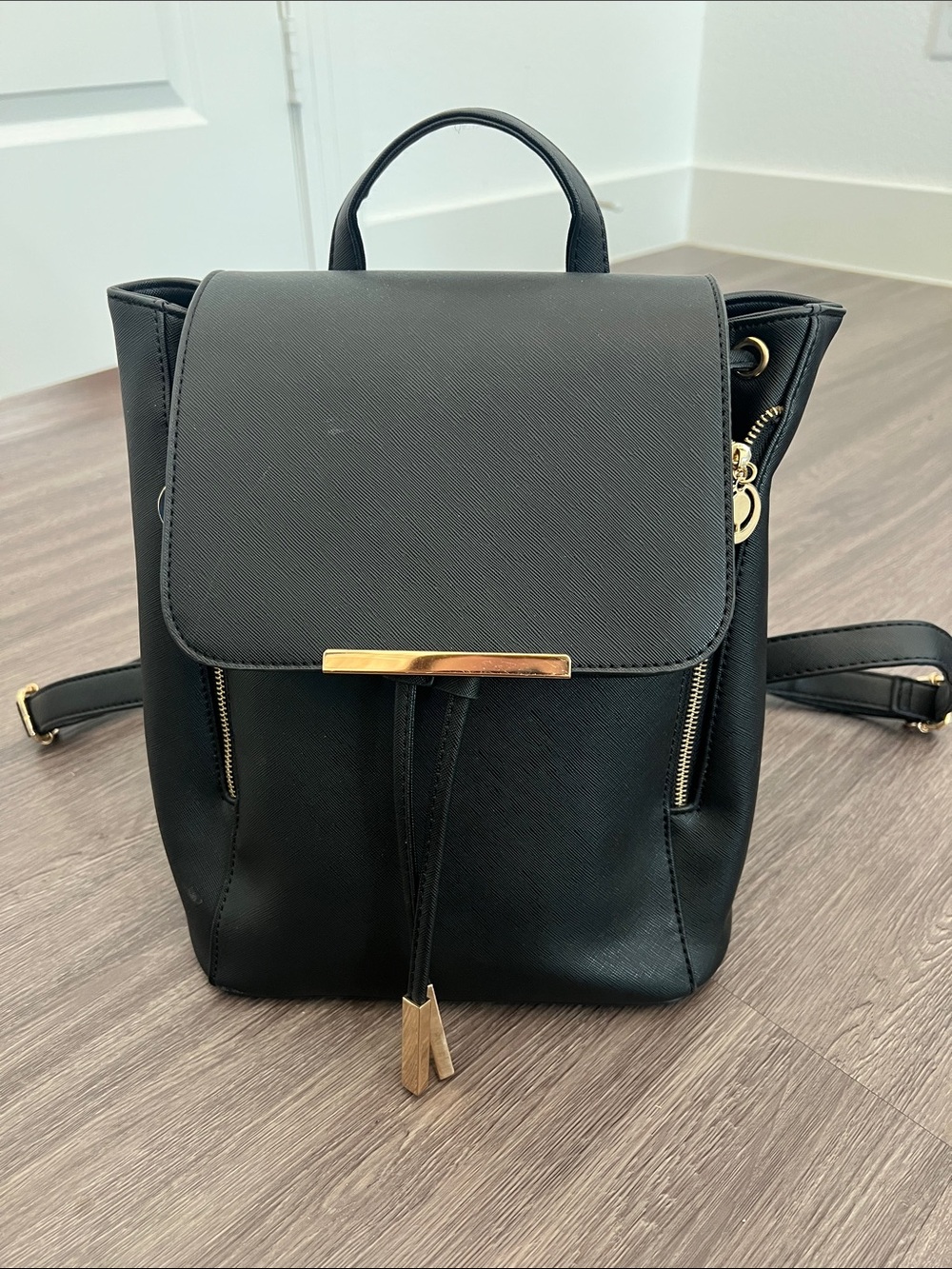 Black Faux Leather Backpack Purse with Gold Accents
